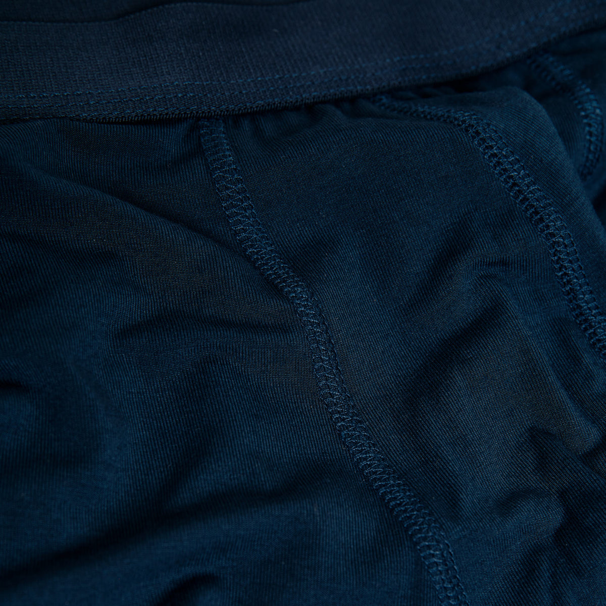 Navy Boxer Trunks 12-Pack, close-up of fabric texture and seams.