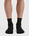 Black Half Crew Socks 12-Pack on legs, showcasing seamless toe and contour seam.