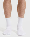 White Half Crew Socks 3-Pack on bare legs, showcasing seamless toe and contour seam.