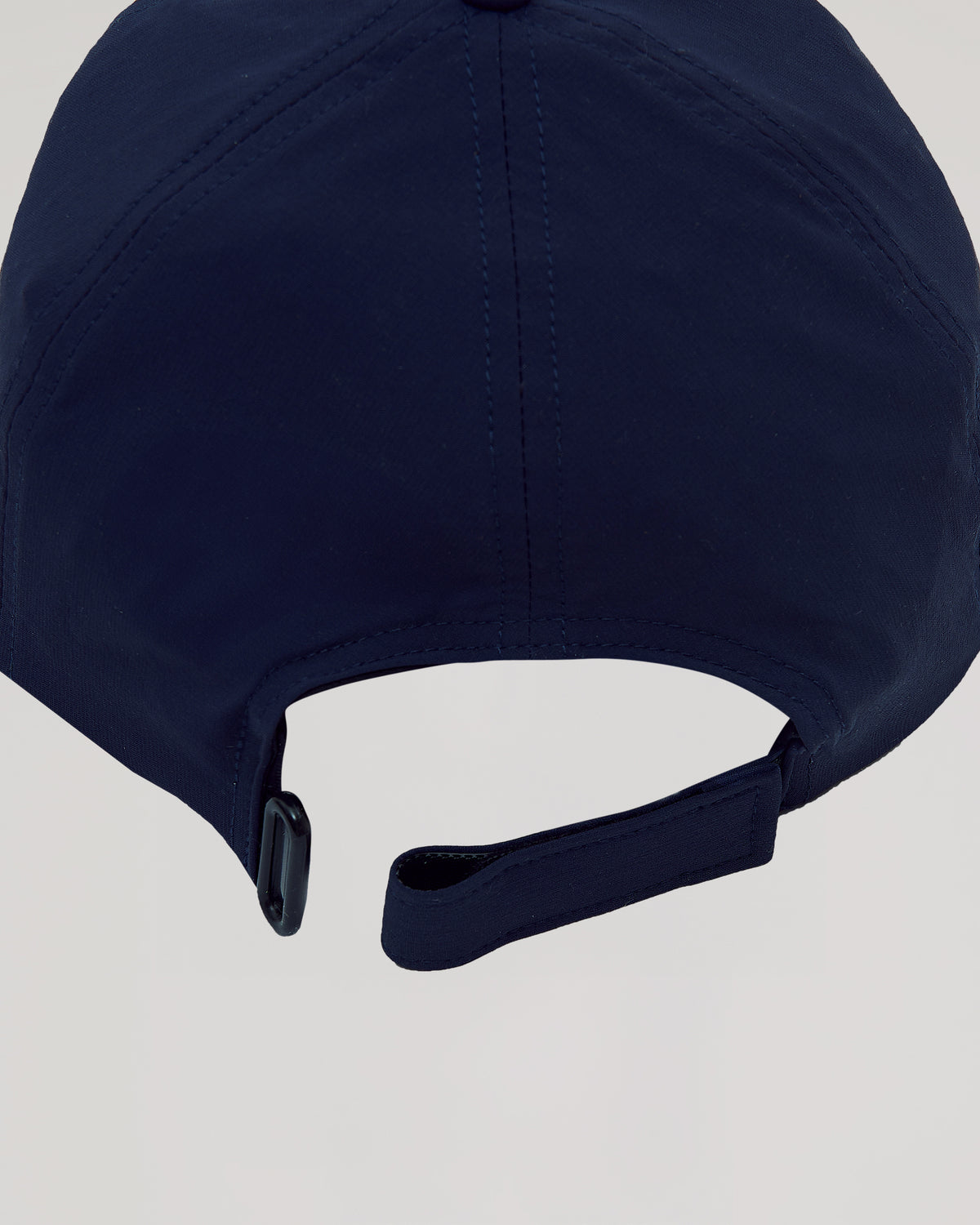 Navy Active Running Cap's adjustable strap with buckle detail.