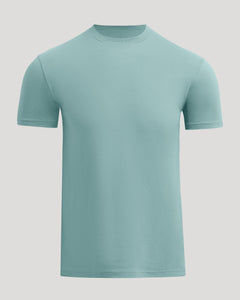 True ClassicA light blue-green crewneck short-sleeve t-shirt displayed on a neutral gray background.