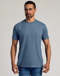 True ClassicMan wearing Dark Heather Tempest Classic Crew Neck with jeans.