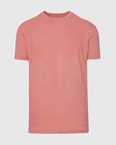 True ClassicHeather Cayenne Classic Crew Neck T-shirt laid flat, showcasing its soft coral hue.