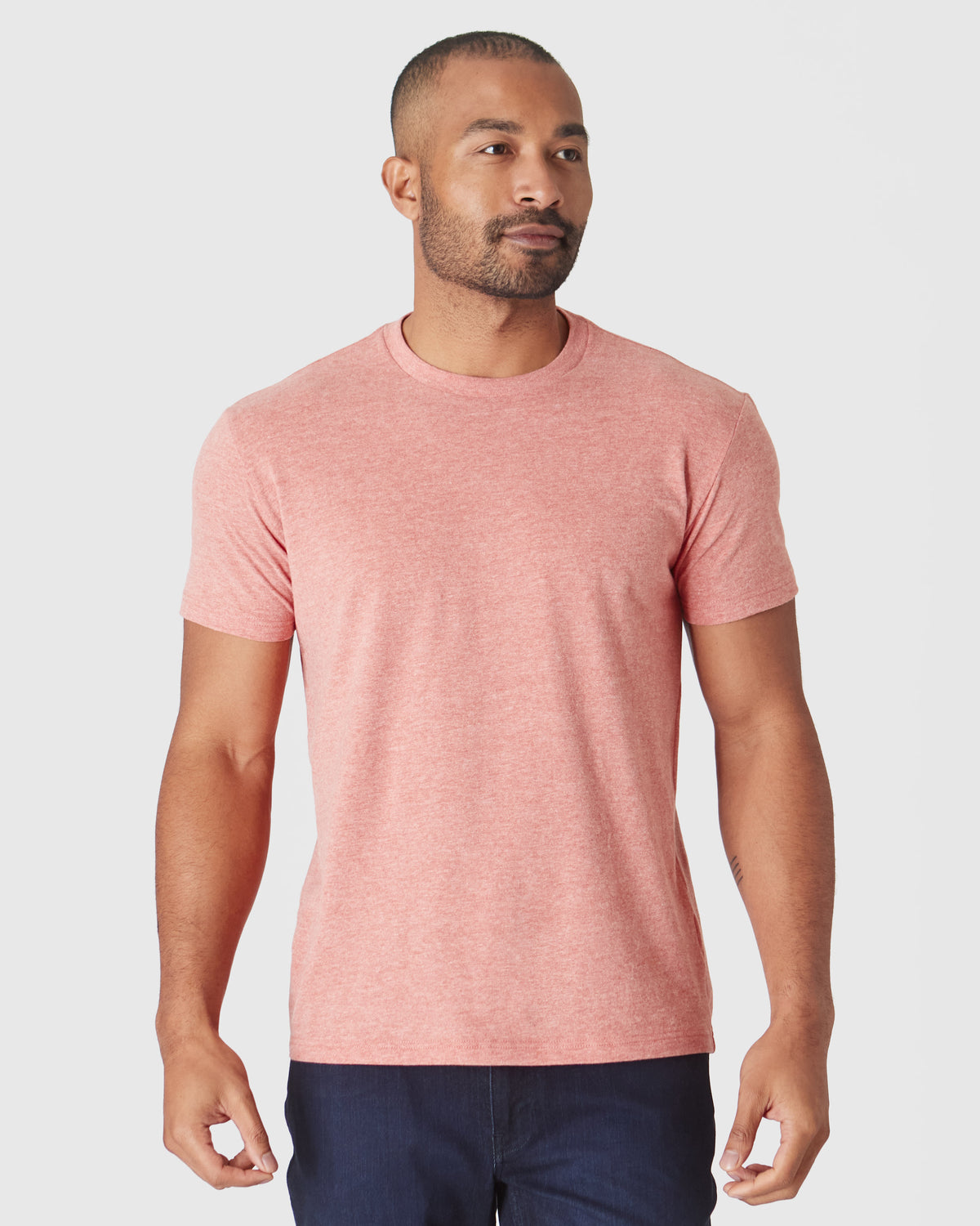 Heather Cayenne Classic Crew Neck on male model, relaxed pose.