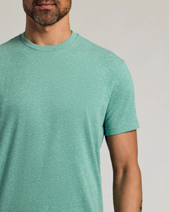 True ClassicLight Heather Greenery Classic Crew Neck on model, showcasing fit and tattoo detail.
