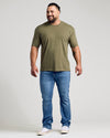 Military green crew neck short sleeve t-shirt on male model.