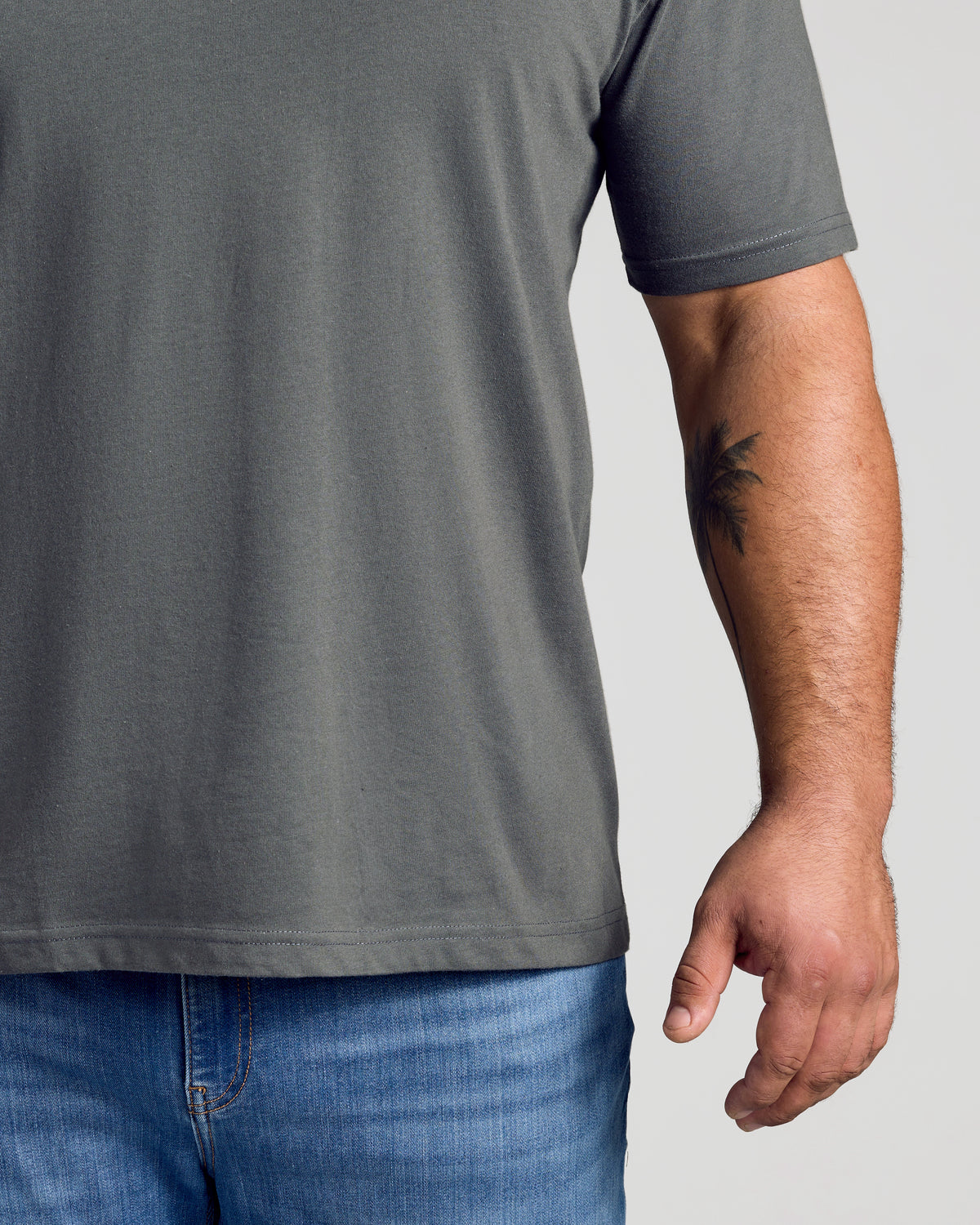 Carbon Classic Crew Neck on person, highlighting contemporary fit.