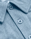 Heather Indigo Short Sleeve Tall Polo with folded collar and top buttons.