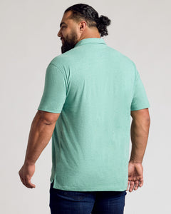 True ClassicBack view of man in Light Heather Greenery Classic Polo.