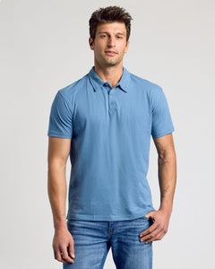 True ClassicMan wearing Indigo Classic Polo and jeans, showcasing the polo's fit.