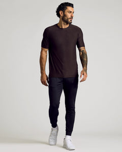 True ClassicMan wearing Dark Heather Cocoa Active Crew Neck Tee with black jogger pants.