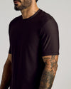 Dark Heather Cocoa Active Crew Neck Tee on tattooed model's upper body.