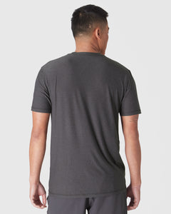 True ClassicMan wearing Dark Heather Tempest Active Crew Neck Tee, showcasing back view.
