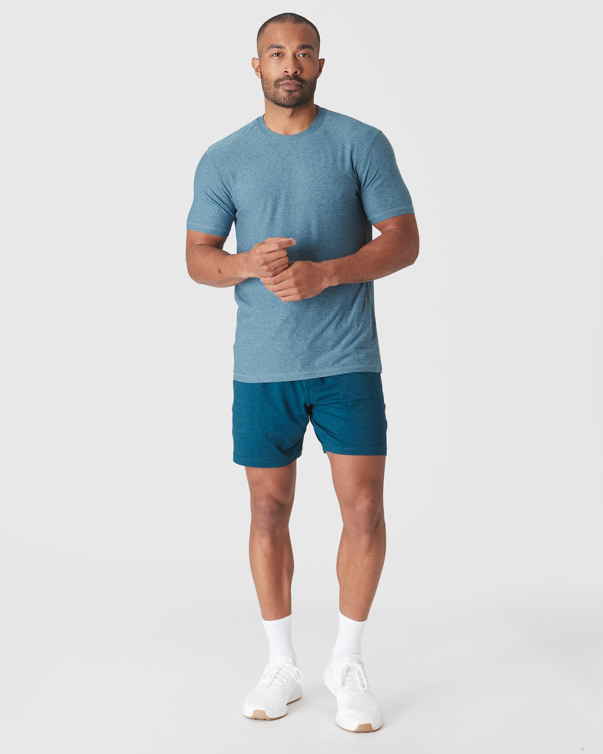 Heather Centurion Short Sleeve Active Crew Neck on male model in studio.
