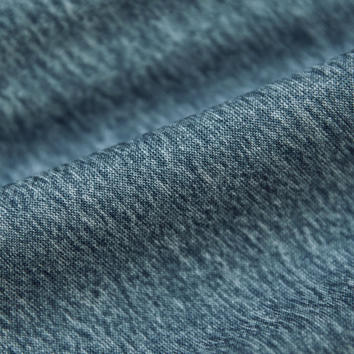Heather Indigo Active Crew Neck Tee fabric close-up, showing woven texture.