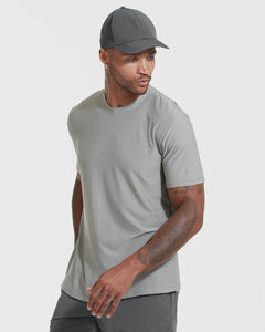True ClassicMan wearing an Iron Gray Active Crew Neck Tee paired with a dark gray cap and pants, showcasing a comfortable and stylish men's basics look.