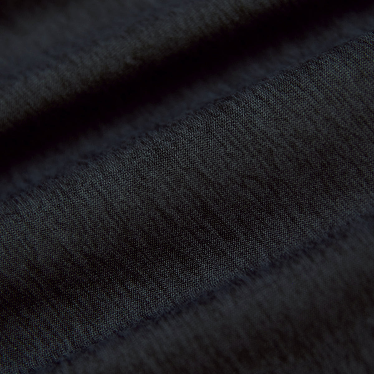 Charcoal Heather Gray Active Polo 2.0 fabric close-up, showcasing weave details.