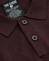 Java Dressy Polo with knitted collar, two-button placket, and “TRUE CLASSIC” label.