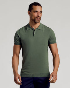 True ClassicModel in Moss Dressy Polo, olive green, with dark trousers.