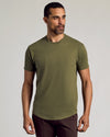 Man wearing The Staple Curved Hem Classic Crew Neck.