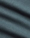 Neptune Curved Hem Classic Crew Neck's fine knit texture with soft folds.