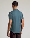 Neptune Curved Hem Classic Crew Neck worn by man from behind.