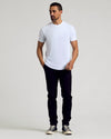 Man wearing Black & White Curved Hem Classic Crew Neck T-shirt.