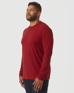 True ClassicMan wearing a crimson long sleeve crew neck shirt, showcasing a clean, classic fit with a soft, comfortable fabric ideal for men's basics.