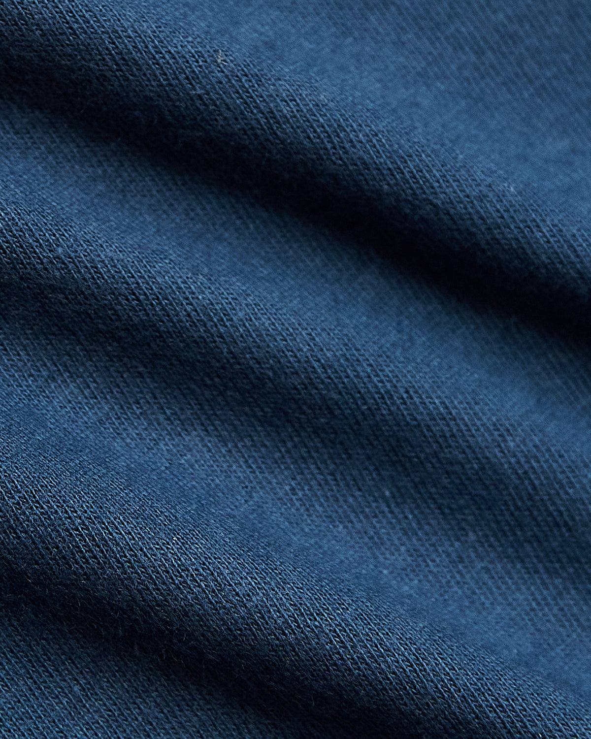 Deep Sea Blue Long Sleeve T-Shirt fabric close-up, showcasing fine weave.