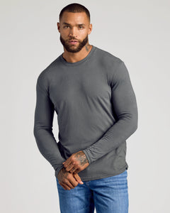True ClassicThe Versatile Crew 9-Pack modeled by man in gray shirt.
