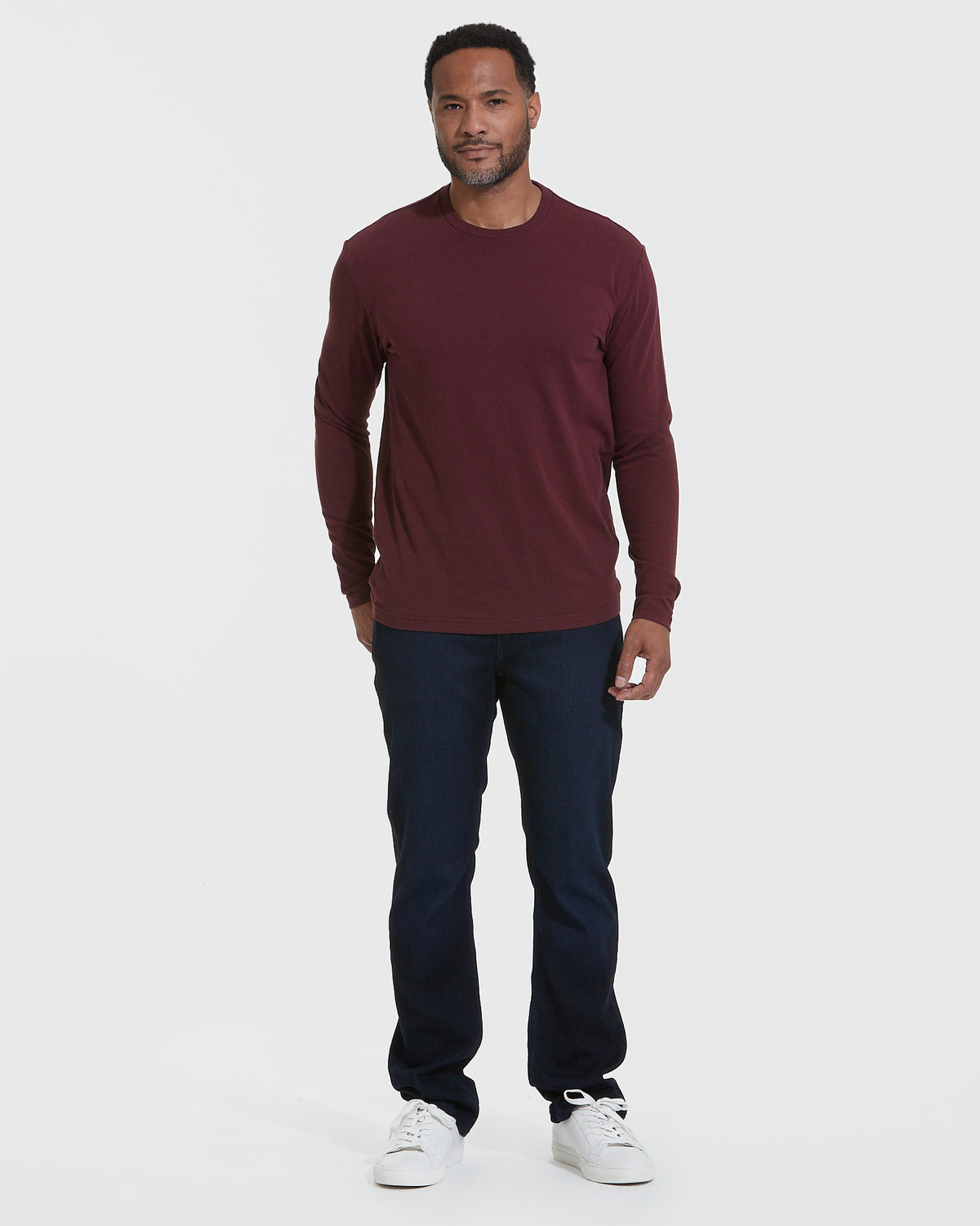 Mahogany Long Sleeve T Shirt worn by a man with jeans.