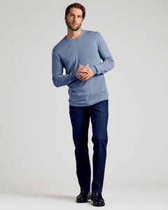 True ClassicFiord Dressy Crew Neck Sweater on male model with jeans and boots.