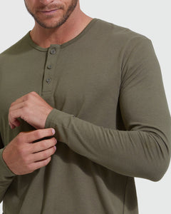 True ClassicMilitary Green Classic Long Sleeve Henley worn, cuff adjusted by a person.