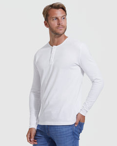 True ClassicWhite Classic Long Sleeve Henley worn by man with blue jeans.