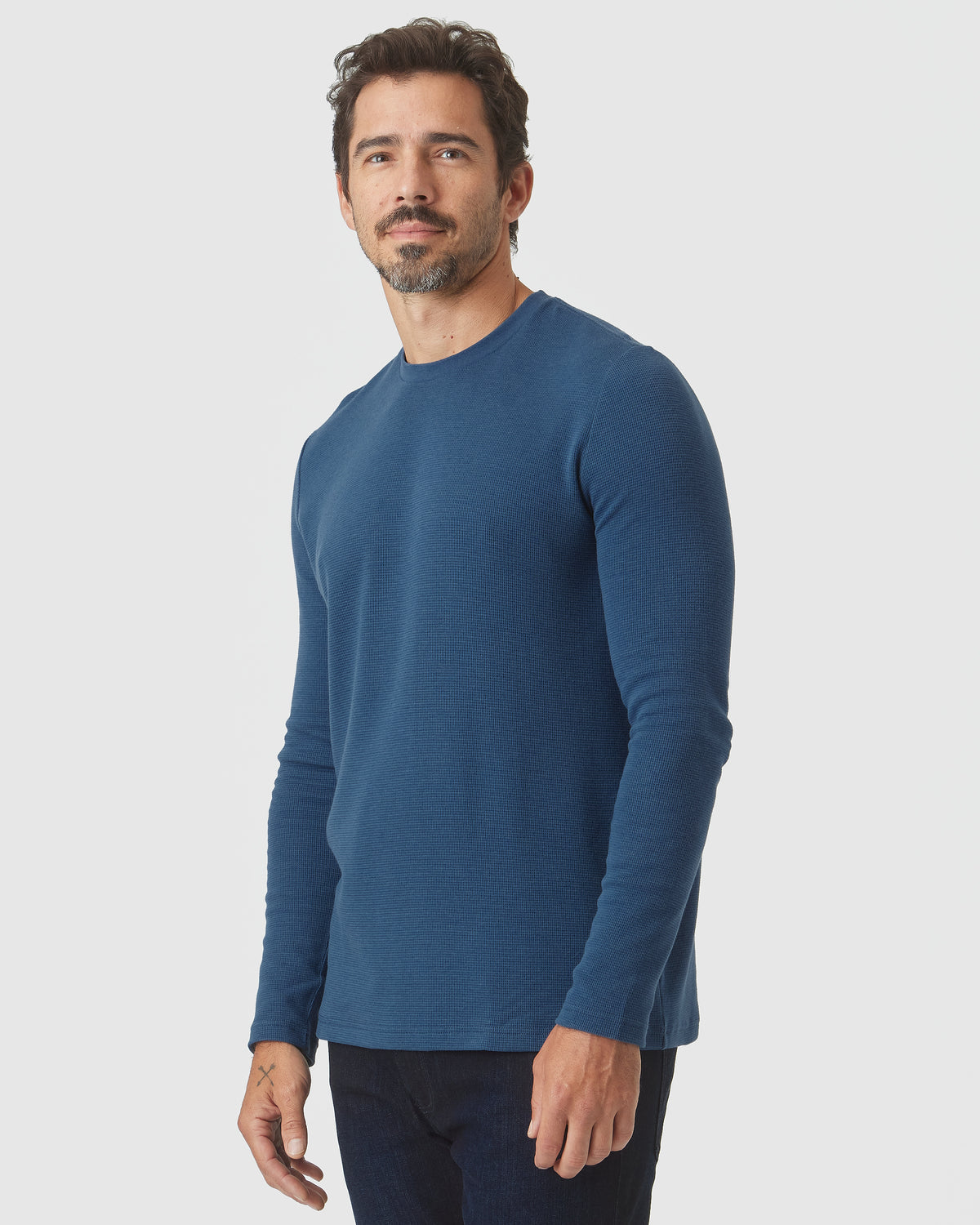 Deep Sea Blue Long Sleeve Waffle Crew worn by tattooed model.