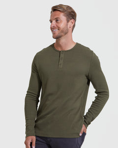 True ClassicModel in Military Green Waffle Long Sleeve Henley and dark pants.