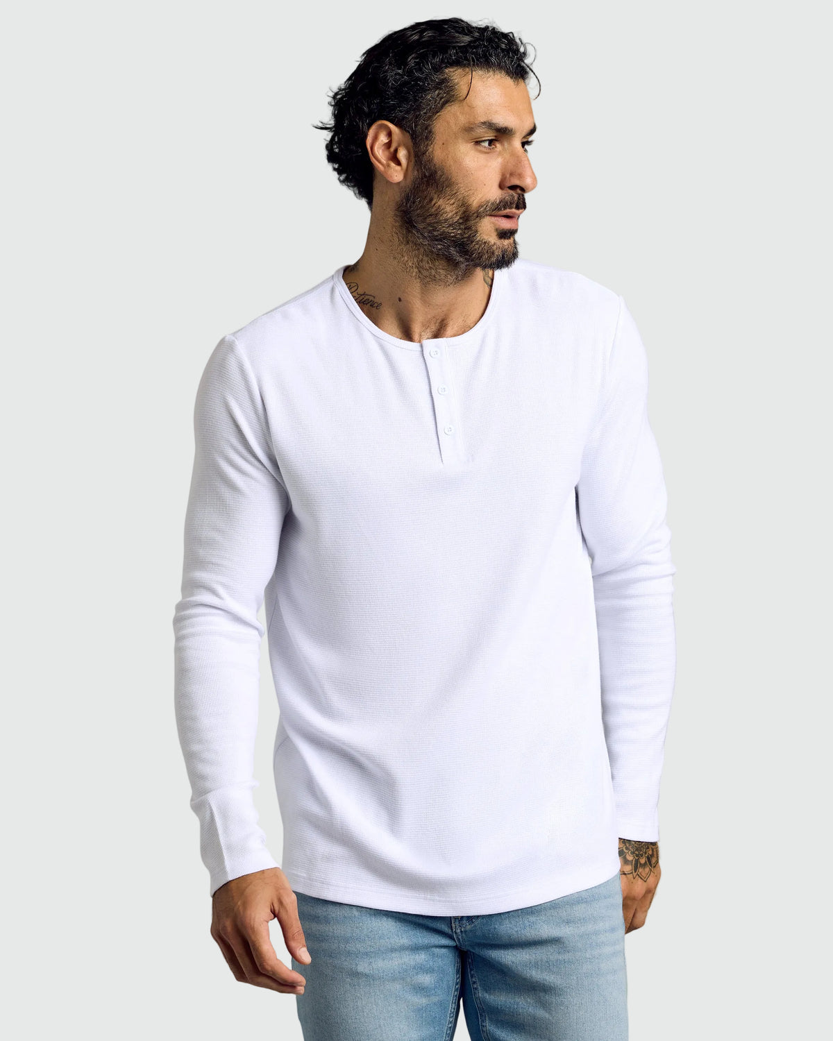 Model in Waffle Long Sleeve Henley, showcasing thermal texture.