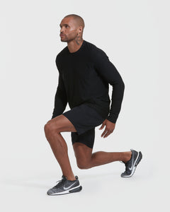 True ClassicMan performing lunge in Black Active Long Sleeve Crew Neck T-Shirt.