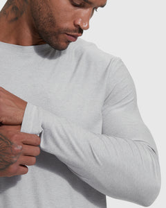 True ClassicMan adjusts cuff of Heather Light Gray Active Long Sleeve Crew T-Shirt.