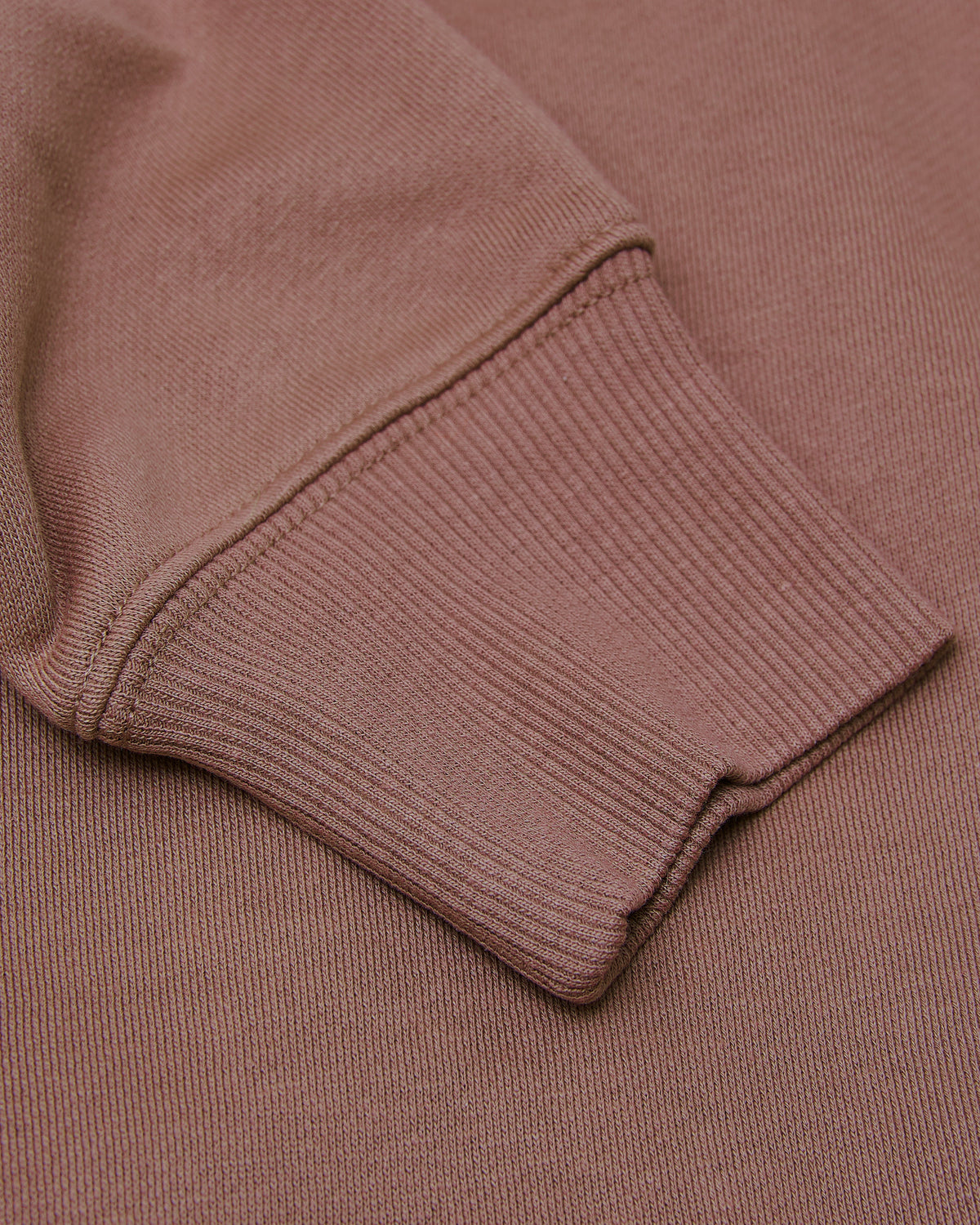 Ribbed cuff of Slate Mauve Fleece French Terry Pullover.