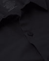 Black Commuter Long Sleeve Shirt with button-up front and fold-over collar.