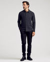 Black Commuter Long Sleeve Shirt worn by model, showcasing slim, fitted style.