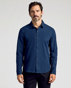 True ClassicNavy Commuter Long Sleeve Shirt worn by man, arms relaxed.