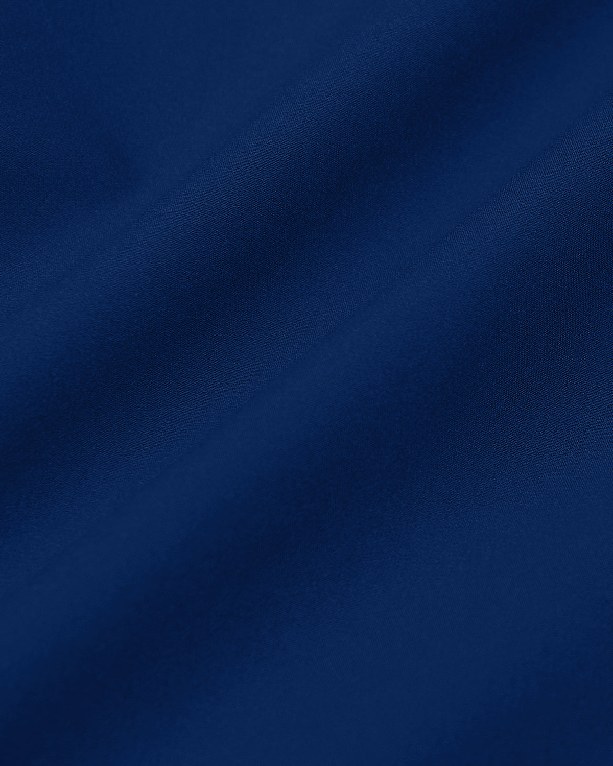 Navy Commuter Long Sleeve Shirt fabric texture with gentle folds.