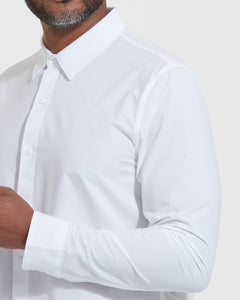 True ClassicWhite Commuter Long Sleeve Shirt with buttons and collar, worn by man.