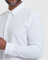 White Commuter Long Sleeve Shirt with buttons and collar, worn by man.