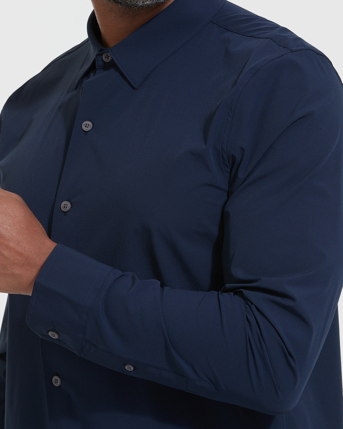 Navy Lightweight Dress Shirt with buttons and 4-way stretch fabric.