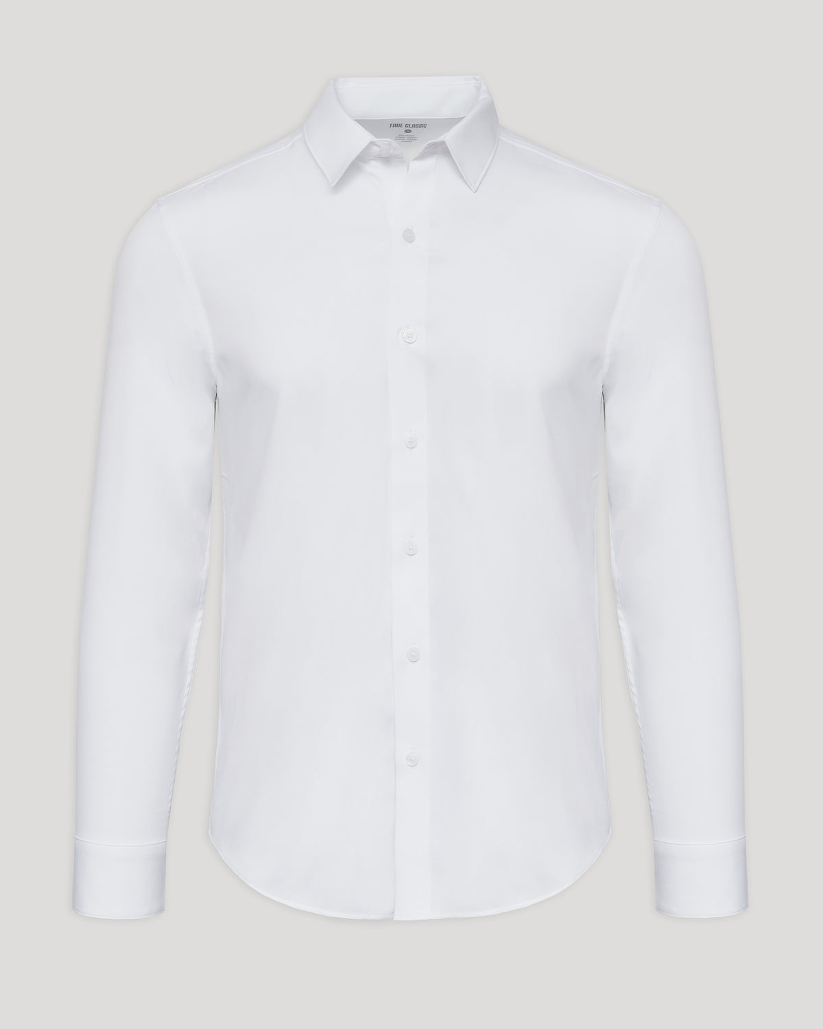 White Performance Long Sleeve Dress Shirt displayed against a neutral background, featuring a classic collar and button-down front for men's basics.