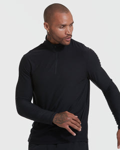 True ClassicMan modeling Black Active Quarter Zip Shirt, showcasing tattooed hand and earring.