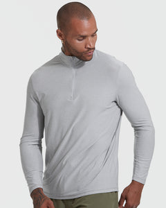 True ClassicMan wearing Light Heather Gray Active Quarter Zip Shirt, looking down.